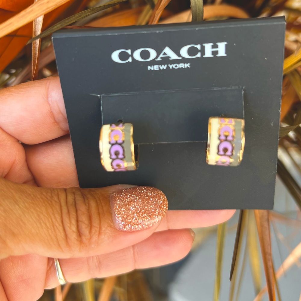 COACH Signature C Huggie Earrings.